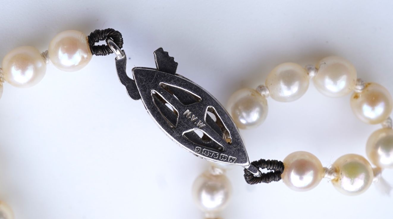 A cultured pearl and diamond necklace, early 20th century